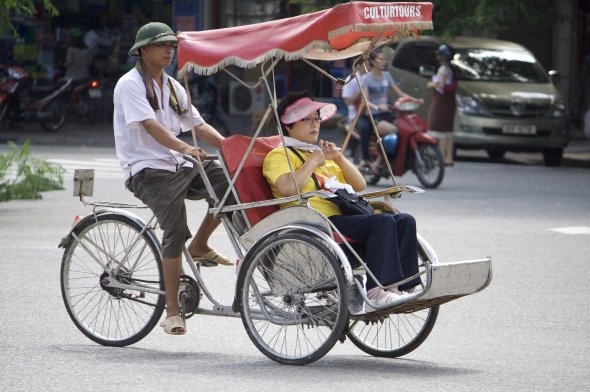 Eine der zahlreichen Fahrradrikschas in der vietnamesischen Hauptstadt Hanoi Eine der zahlreichen Fahrradrikschas in der vietnamesischen Hauptstadt Hanoi